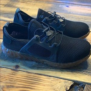 Men’s size 12 “indestructible” steel toed shoes